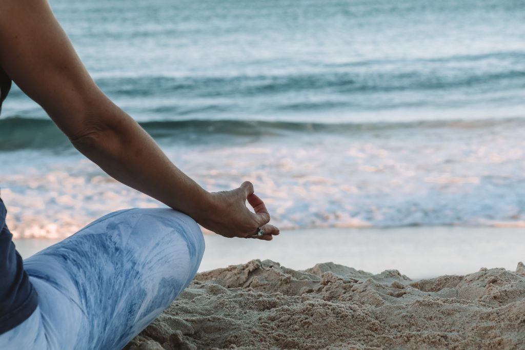 meditating on the beach